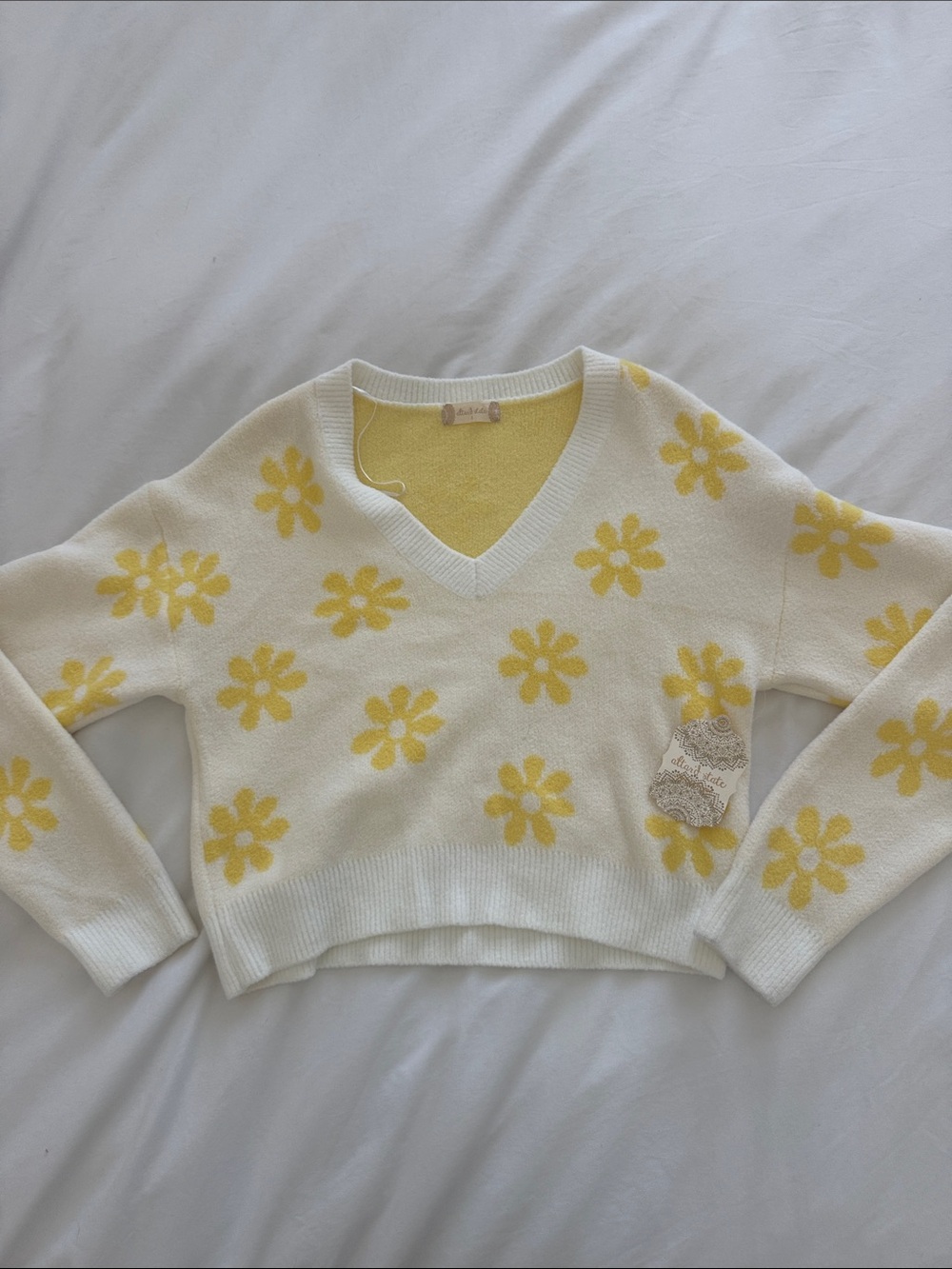 Women’s Cream V-Neck Sweater with Yellow Daisy Pattern